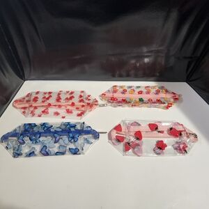 Set of Four Floral and Butterfly Print Pencil Cases